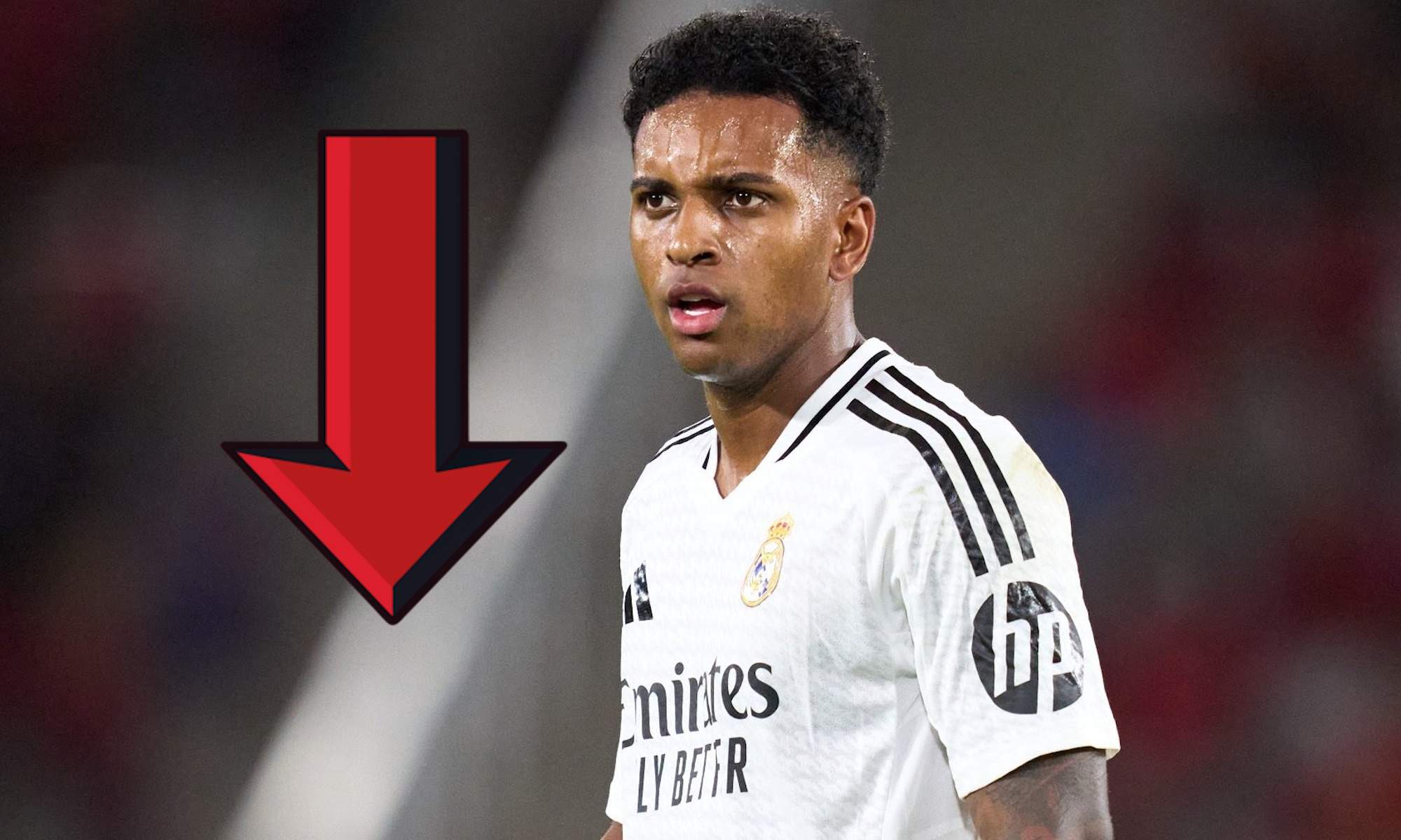 Rodrygo Goes y flecha roja abajo